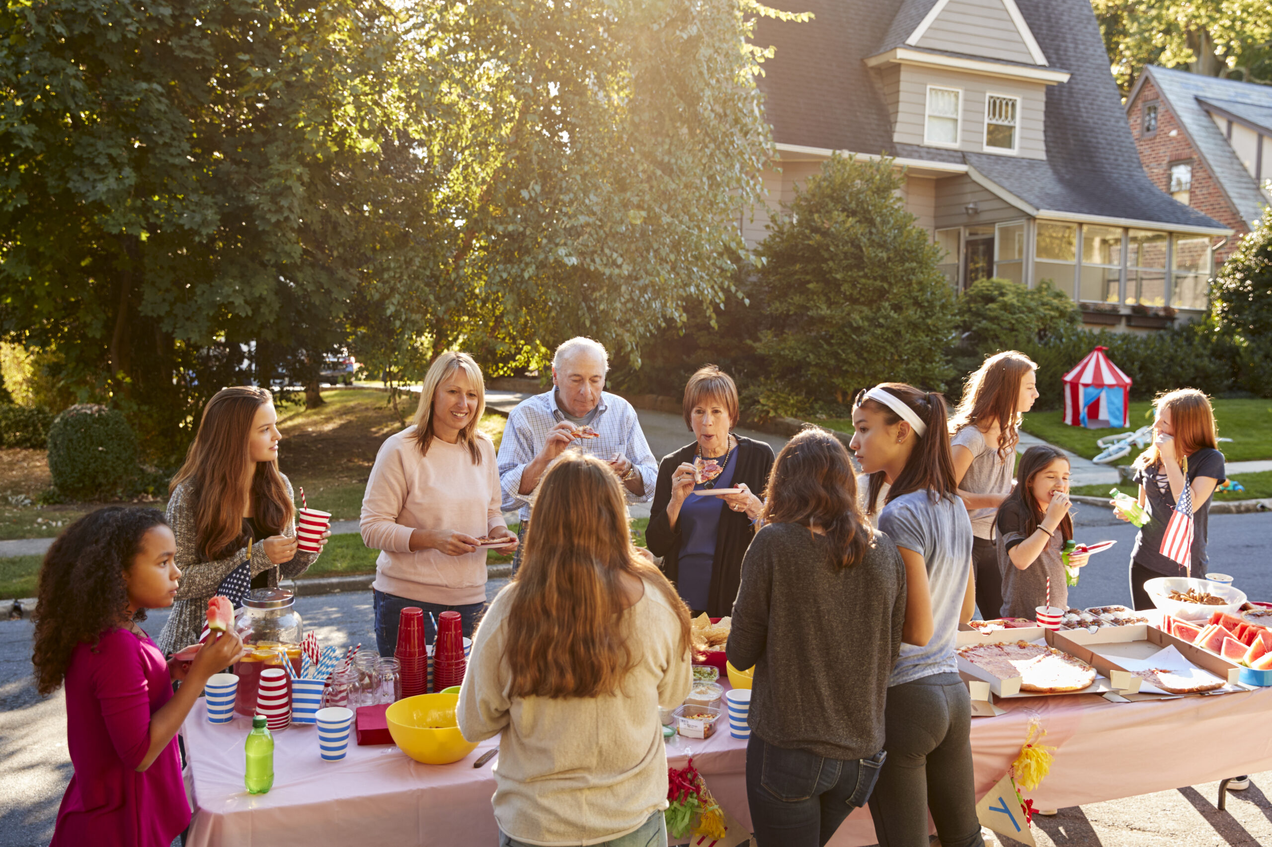 Neighbors build community at a block party.